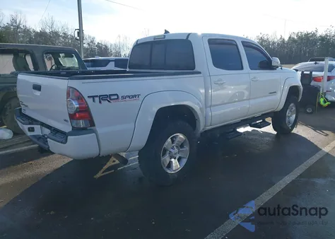 2014 Toyota Tacoma Base V6 z USA, uszkodzony, nr VIN 5TFLU4EN4EX099014